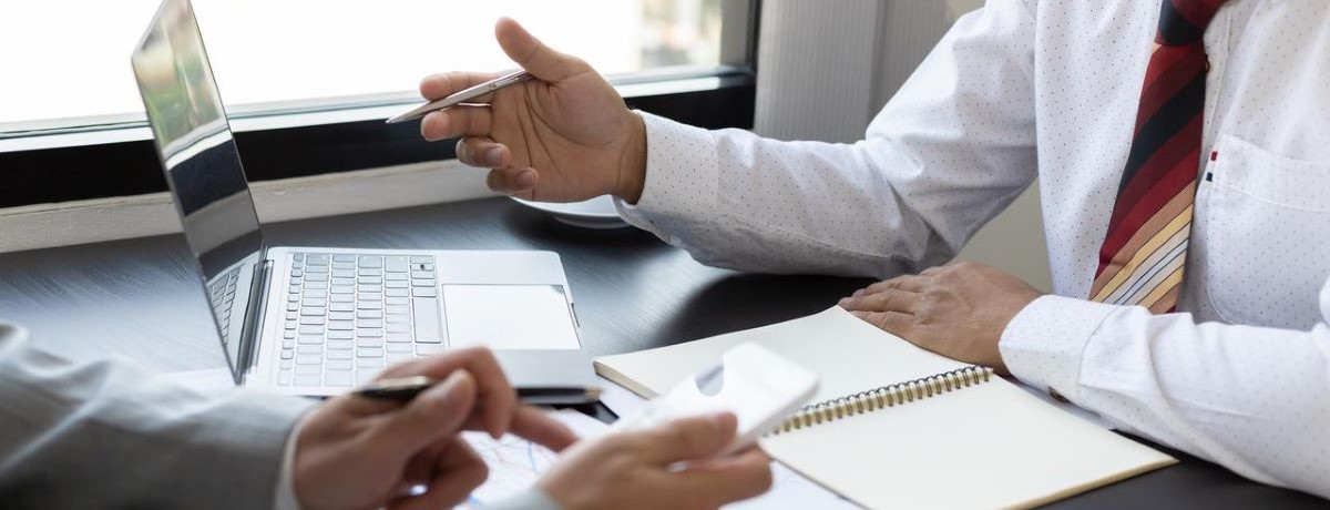 businessmen discussing chubb risk consulting 