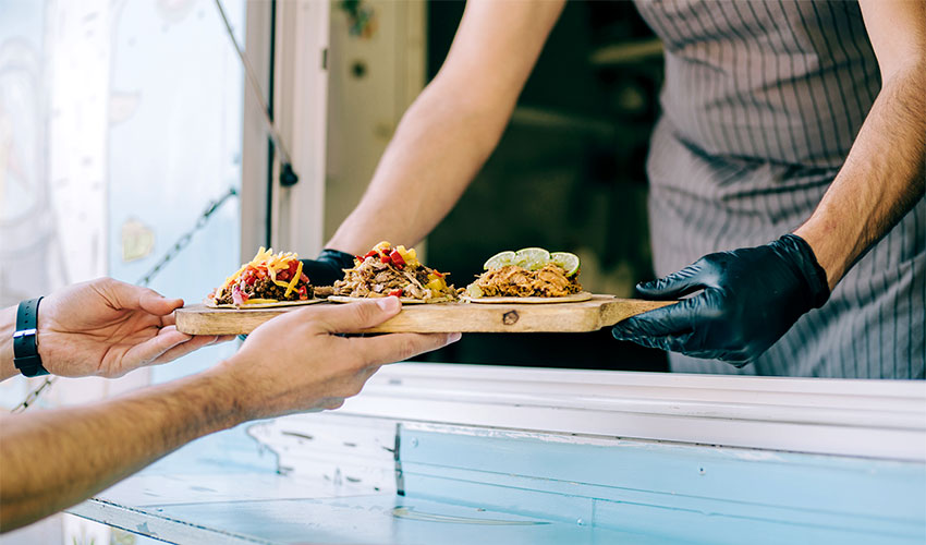 food truck serves customer
