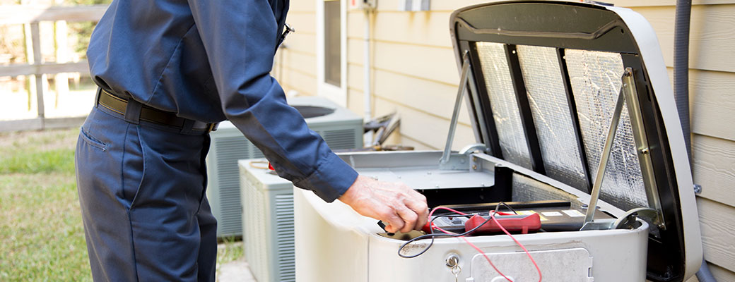 technician checking generator