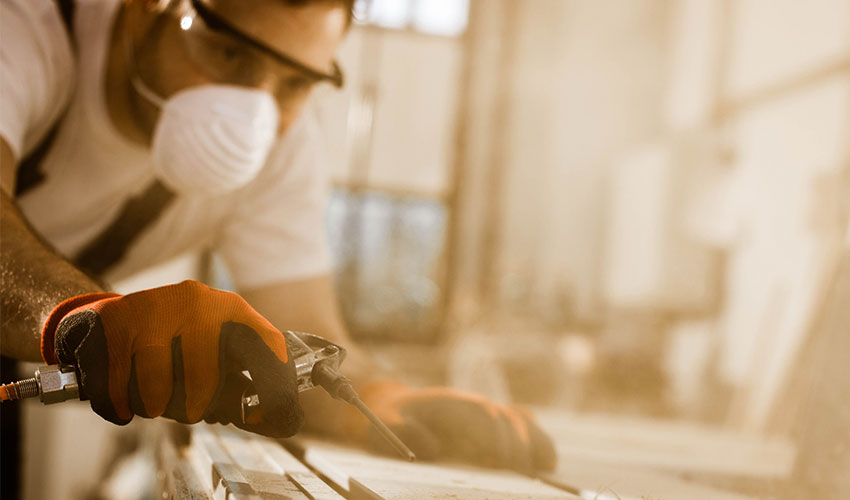 craftsman wearing protective gear